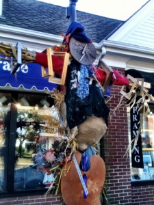 The scarecrow on the lampost in front of Cape Gallery Framer