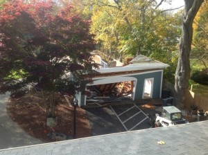 Demolishing the Captain's Manor Garage so we can build a new Carriage House innkeepers quarters